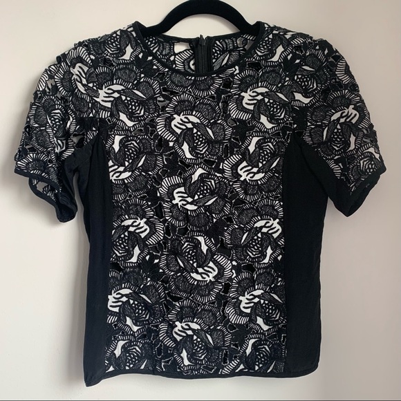 Nanette Lepore Tops - Nanette Lepore Black White Bold Lace Cut Blouse